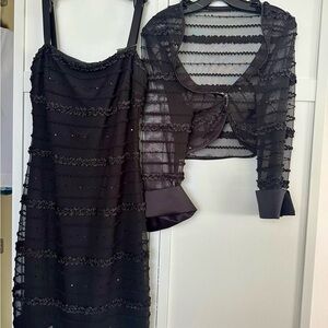 Slimming black evening dress and a top for a woman with curves..
